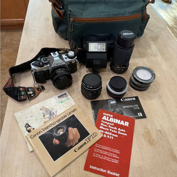 Canon AE-1 Camera with 4 Lenses, Speedlite, Filters and Case